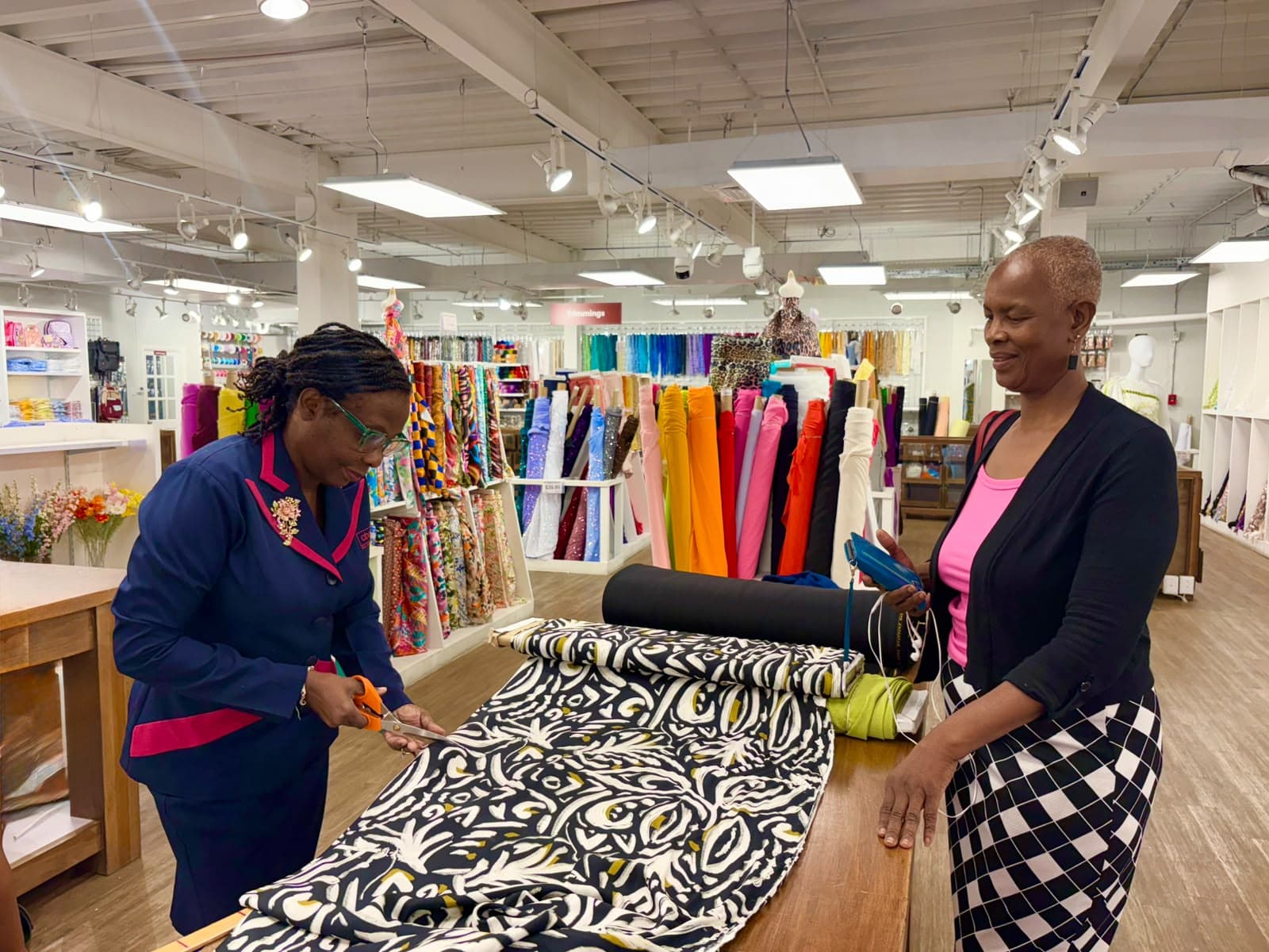 Abeds team member advising a customer